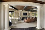 Garage and Home Theater Room Type Stunning architectural details, columns, entertainment room, home theater, wood beam ceilings, fireplace design, game room.  Photo 1 of 155 in Tuscan Villa by JMAD