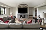Lower level, finished basement, entertainment room, game room, man cave, home theater, bar, arcade.