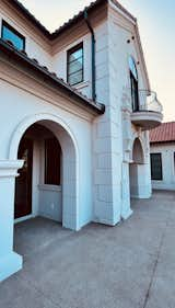 Stunning home entry. Exterior design details. Baroque balcony.