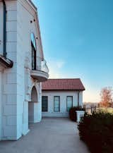 Stunning home entry. Exterior design details. Baroque balcony.