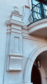 Stunning home entry. Exterior design details. Baroque balcony.