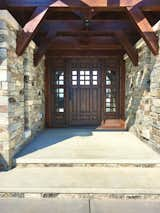 Covered entrance, custom timber work.