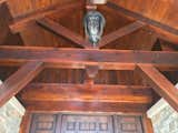 Covered entrance, wood ceiling design, custom timber work.