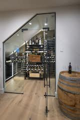 Wine cellar underneath staircase.