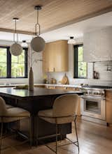 Modern Kitchen, White oak cabinets, kitchen island, wood ceiling, zellige tile, tiled hood, black windows