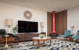 Living Room, Recessed Lighting, Chair, Media Cabinet, End Tables, Table Lighting, Coffee Tables, Lamps, Corner Fireplace, Floor Lighting, Table, Accent Lighting, and Vinyl Floor Living room close up  Photo 14 of 31 in Midcentury Lafayette by Alina Druga Interiors