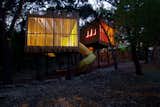 Exterior: at night the structures become lanterns in the landscape, reflecting their interior colors.
