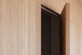 Hallway and Medium Hardwood Floor Bamboo Volume Detail  Photo 14 of 23 in Curves of Progress: A Contemporary Rehabilitation in Graça, Lisbon by blaanc