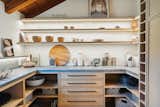 Kitchen, Accent Lighting, Stone Slab Backsplashe, Open Cabinet, Stone Counter, and Wood Cabinet Pantry  Photo 7 of 18 in Casa Serena by The Nature Studio