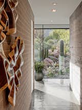 Hallway and Concrete Floor Gallery view with planters mirroring exterior landscaping.  Photo 7 of 15 in Big Girl House by Tate Studio Architects
