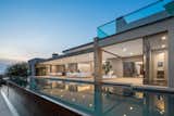 Outdoor, Large Patio, Porch, Deck, Infinity Pools, Tubs, Shower, Desert, Large Pools, Tubs, Shower, and Back Yard Infinity pool and back of home.  Photo 14 of 16 in Minimalist Impact by Tate Studio Architects