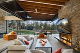 Upper deck overlooks golf course and seamlessly connects with the interiors.