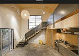 Living Room, Concrete Floor, Gas Burning Fireplace, Track Lighting, Pendant Lighting, Recessed Lighting, Corner Fireplace, and Storage Open living loft and staircase   Photo 10 of 12 in Shoofly by S Sandston Greathouse Workroom