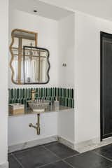 Imported ceramic Moroccon Basin and bamboo mirror in the dining area
