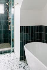 Bath Room, Enclosed Shower, Porcelain Tile Wall, Terrazzo Floor, and Freestanding Tub  Photo 8 of 13 in Clean lines with a retro spin by Jill Lamphier