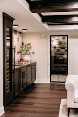 Custom Cabinetry and Custom Iron Doors Wet Bar and Wine Room