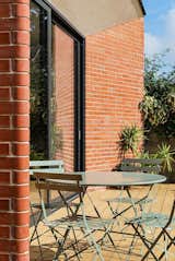The South-East facing patio transforms into a sun trap, offering the ideal setting for a delightful breakfast bathed in the warmth of the morning sun.
