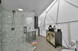 Bath Room, Vessel Sink, One Piece Toilet, Ceramic Tile Floor, Wall Lighting, Accent Lighting, Ceramic Tile Wall, Mosaic Tile Wall, and Full Shower Ensuite Bathroom in Geo Dome  Photo 3 of 9 in Out Of This World Geo Dome by Garrett Brown