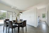 Dining Room, Chair, Table, Pendant Lighting, and Storage  Photo 3 of 10 in Steller House by Gisela Schmoll Architect, PC