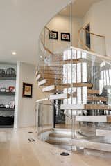 Staircase, Wood Tread, and Glass Railing  Photo 4 of 17 in Bent Glass Freestanding Staircase by John Flagg