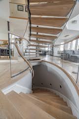 Staircase, Wood Tread, and Glass Railing  Photo 9 of 17 in Bent Glass Freestanding Staircase by John Flagg