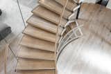 Staircase, Glass Railing, and Wood Tread  Photo 13 of 17 in Bent Glass Freestanding Staircase by John Flagg
