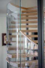 Staircase, Glass Railing, and Wood Tread  Photo 14 of 17 in Bent Glass Freestanding Staircase by John Flagg
