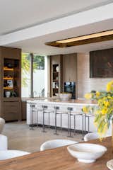 The grand kitchen with its statement island is the heart of the home and plays with both proportion and curves. 