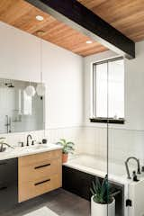 Bath Room, Undermount Tub, Open Shower, Engineered Quartz Counter, Ceramic Tile Floor, Pendant Lighting, Porcelain Tile Wall, Recessed Lighting, and Undermount Sink  Photo 14 of 19 in Scandinavian Mid-Mod Ranch by Clark Thomas