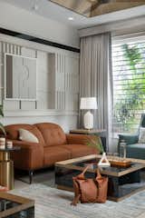 The introduction of Grey mirrors augments spatial dimensions, while thoughtfully selected abstract artwork imparts a touch of contemporary elegance. 