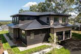 Exterior, Shingles Roof Material, Wood Siding Material, House Building Type, and Hipped RoofLine Tesla Roof  Photo 2 of 7 in Quincy Quarries by MASS Architect