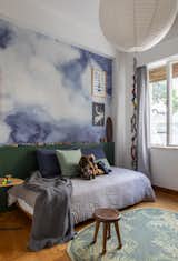 The boy's room has wallpaper reminiscent of the sea, a collection of Lego figures and an Arraiolo rug made by his great-grandmother.