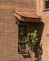 Window detail - Mangalore tile overhang