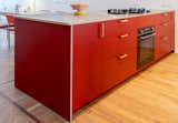 Red Brick kitchen island aligned with the original floor