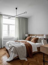 Bedroom, Table Lighting, Ceiling Lighting, Bed, and Light Hardwood Floor Chandelier, Atelier Areti. Table lamps, Gubi.  Photo 2 of 11 in New Life of a 80 m2 Moscow Apartment by Static Aesthetic Architects by Static Aesthetic Architects