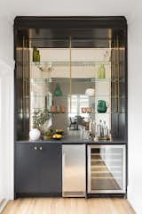 Kitchen, Wine Cooler, Accent Lighting, Ice Maker, and Mirror Backsplashe  Photo 7 of 34 in The Luke House by Helen Boucher