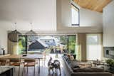 Dining Room, Table, Chair, Concrete Floor, and Pendant Lighting Living  Photo 8 of 10 in McNeill House by ARYZE Developments Inc.