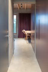 Hallway and Concrete Floor Master bedroom with desk and storage  Photo 5 of 12 in Villa Kummelnäs by Sigrid Svensson