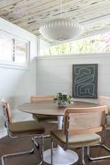 Dining Room, Chair, Table, Dark Hardwood Floor, and Ceiling Lighting Dining room  Photo 8 of 13 in Midcentury Retro Revival by Studio Connolly