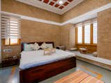 Bedroom, Limestone Floor, Bed, Marble Floor, Ceiling Lighting, and Night Stands Master Bedroom  Photo 18 of 44 in Audumbara by Tropic Responses