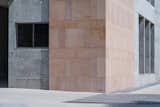 The Brutalist exposed concrete harmonizes with the ethereal Jodhpur pink sandstone, radiating a blend of modernity and timeless elegance