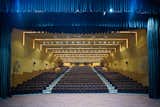 The auditorium seats 600+ attendees, with VIP lounges for distinguished guests and green rooms for the performers