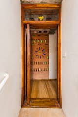Doors, Wood, Swing Door Type, and Interior The Bottle Wall   Photo 2 of 26 in The Ashirwad Home by Lavannya Goradia