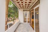 Outdoor, Hanging Lighting, Rooftop, Small Patio, Porch, Deck, and Trees The tree terrace and filler slab  Photo 14 of 26 in The Ashirwad Home by Lavannya Goradia