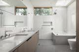 Bath Room, One Piece Toilet, Porcelain Tile Floor, Engineered Quartz Counter, Open Shower, Porcelain Tile Wall, Undermount Tub, Ceiling Lighting, and Undermount Sink  Photo 9 of 9 in Carmel Modern by Samuel Pitnick