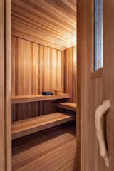 Steps away from the deck hot tub, an indoor sauna offers an alternative for relaxing and staying toasty in the colder months.