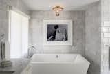 Bath Room, Accent Lighting, Soaking Tub, and Stone Tile Wall  Photo 2 of 9 in Oak Creek by Inside Stories