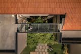 Glass bridge connecting terraces