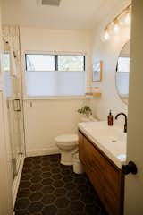 Bath Room, Quartzite Counter, Wall Mount Sink, Full Shower, Ceiling Lighting, Porcelain Tile Floor, and Wall Lighting Master bathroom  Photo 15 of 15 in The Mid Century Modern Retreat by Sarah Blesse