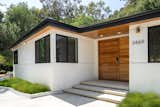 Exterior, House Building Type, Shingles Roof Material, Mid-Century Building Type, Stucco Siding Material, and Gable RoofLine Main Entrance - Front Yard  Photo 4 of 15 in Mandeville Canyon - Mid Century Modern Revamp by Mark Nichols - MNichols Design